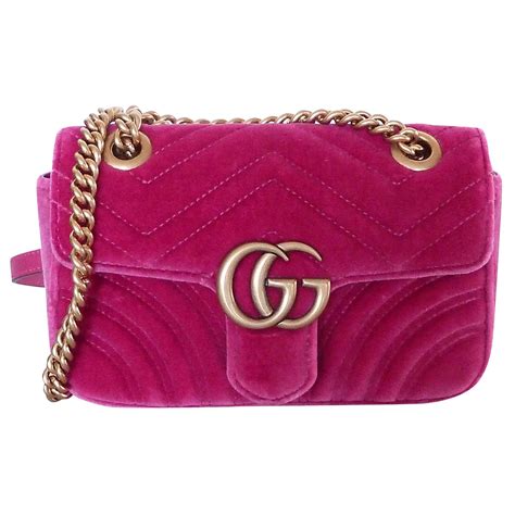 pink velvet gucci purse